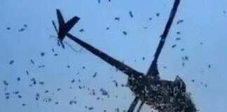 Helicóptero lança ‘chuva de dinheiro’ e surpreende moradores de rua nos EUA