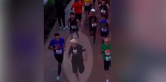 Embriagado e de chinelo, homem invade corrida e vira sensação Corredor chinelo d24am